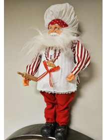 Père Noël cuisinier debout