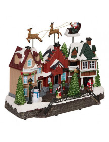 Village de Noël avec père Noël et rennes