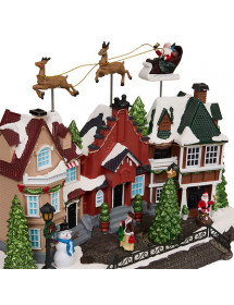 Village de Noël avec père Noël et rennes